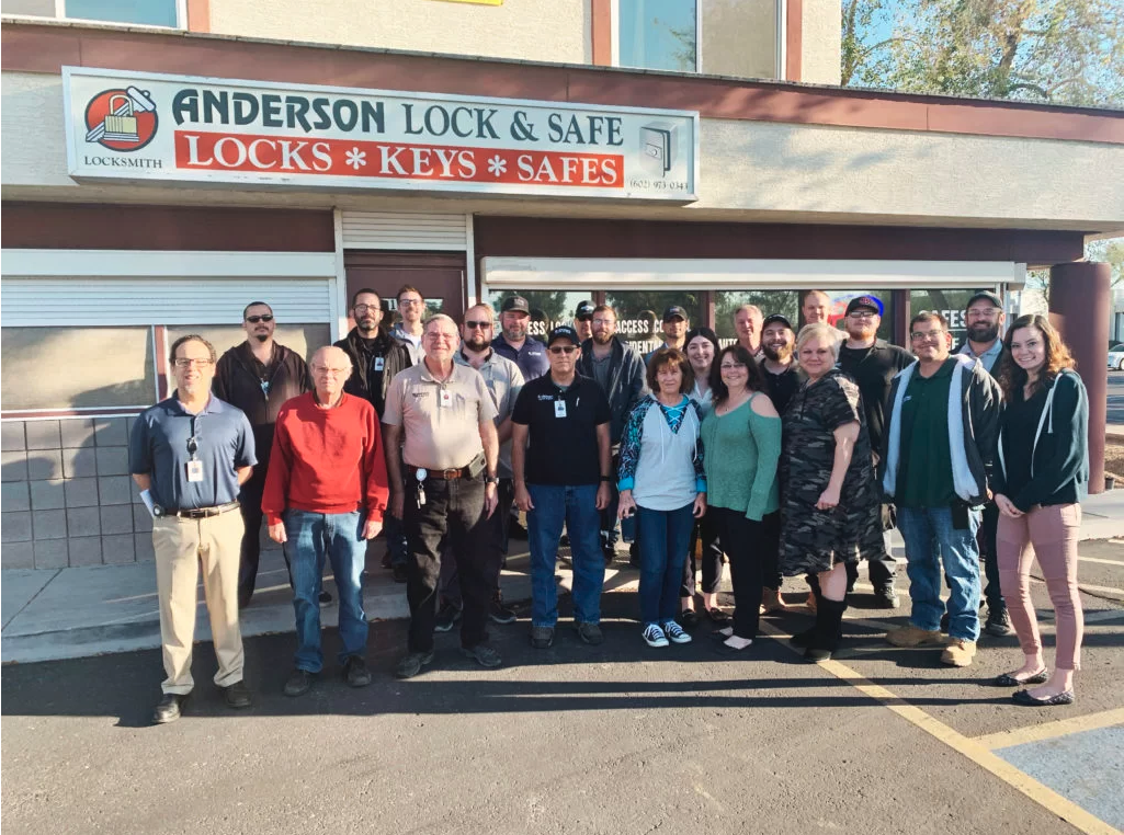Anderson Lock & Safe staff in front of storefront
