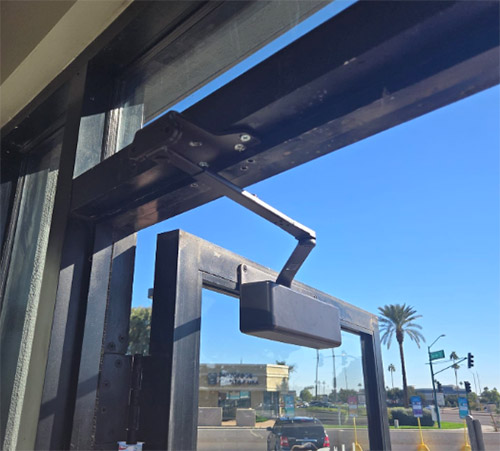 commercial door closer (top) and crach bar (bottom)